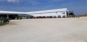 Vehicles in front of shop